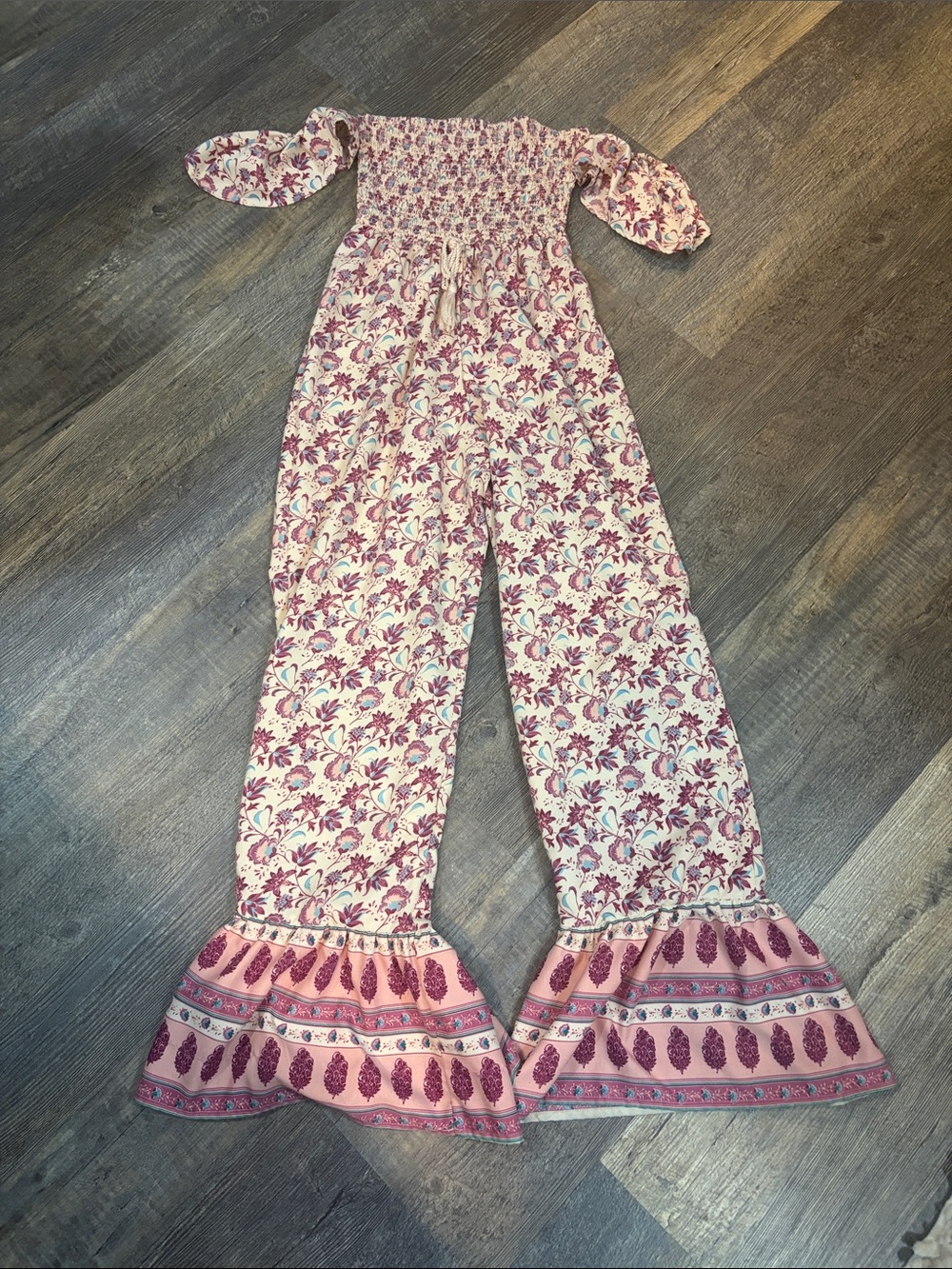 Smocked Off-Shoulder Floral Jumpsuit in Pink